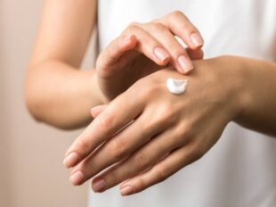 skincare. close up view of woman hand moisturising them with cream. skincare. skincare. close up view of woman hand moisturising them with cream. skincare.